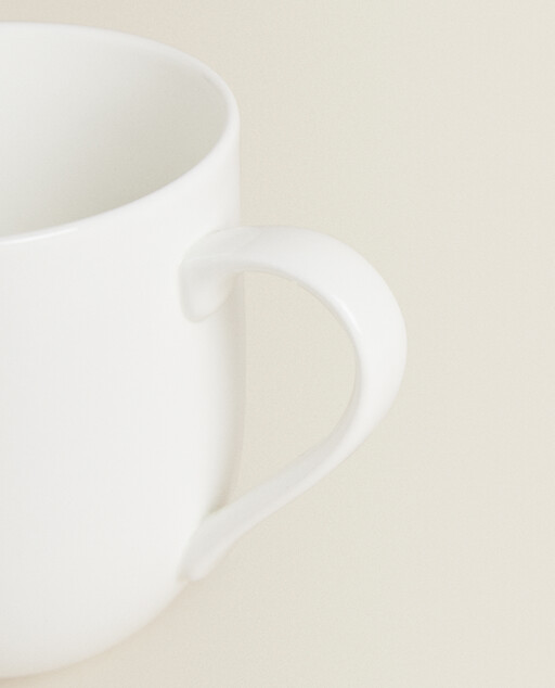 white porcelain tumbler