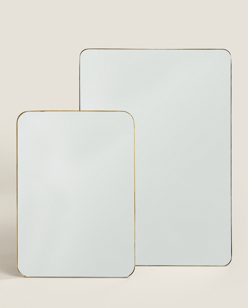 MIRROR WITH CURVED FRAME
