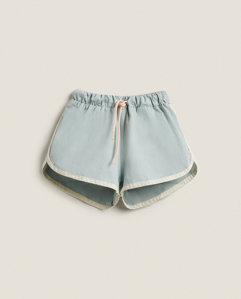 BOYS’ SWIMMING TRUNKS WITH TRIM