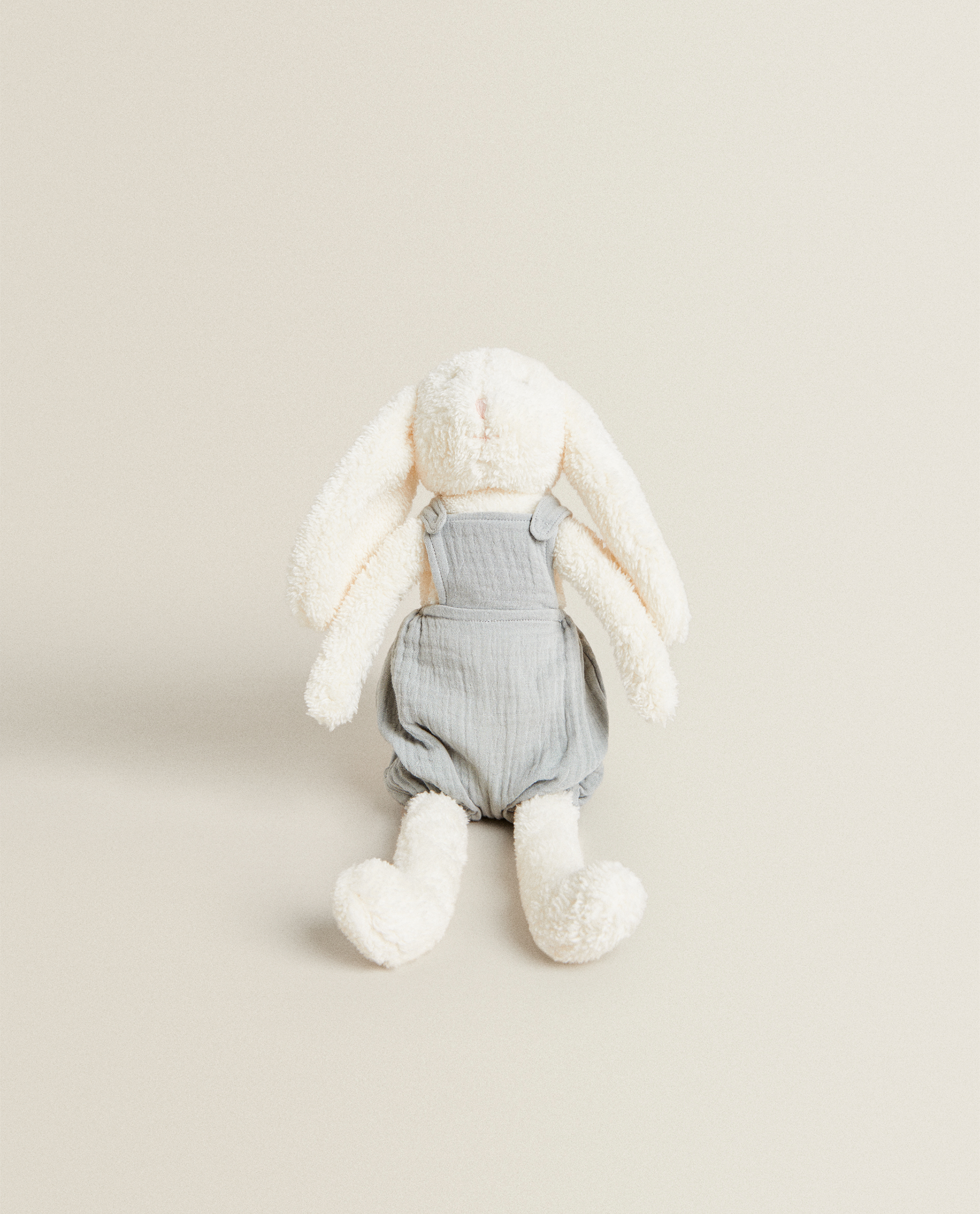 stuffed bunny with overalls