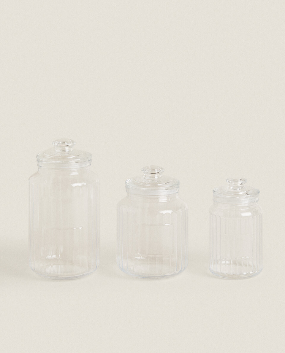 GLASS JAR WITH RAISED DESIGN AND LABELS