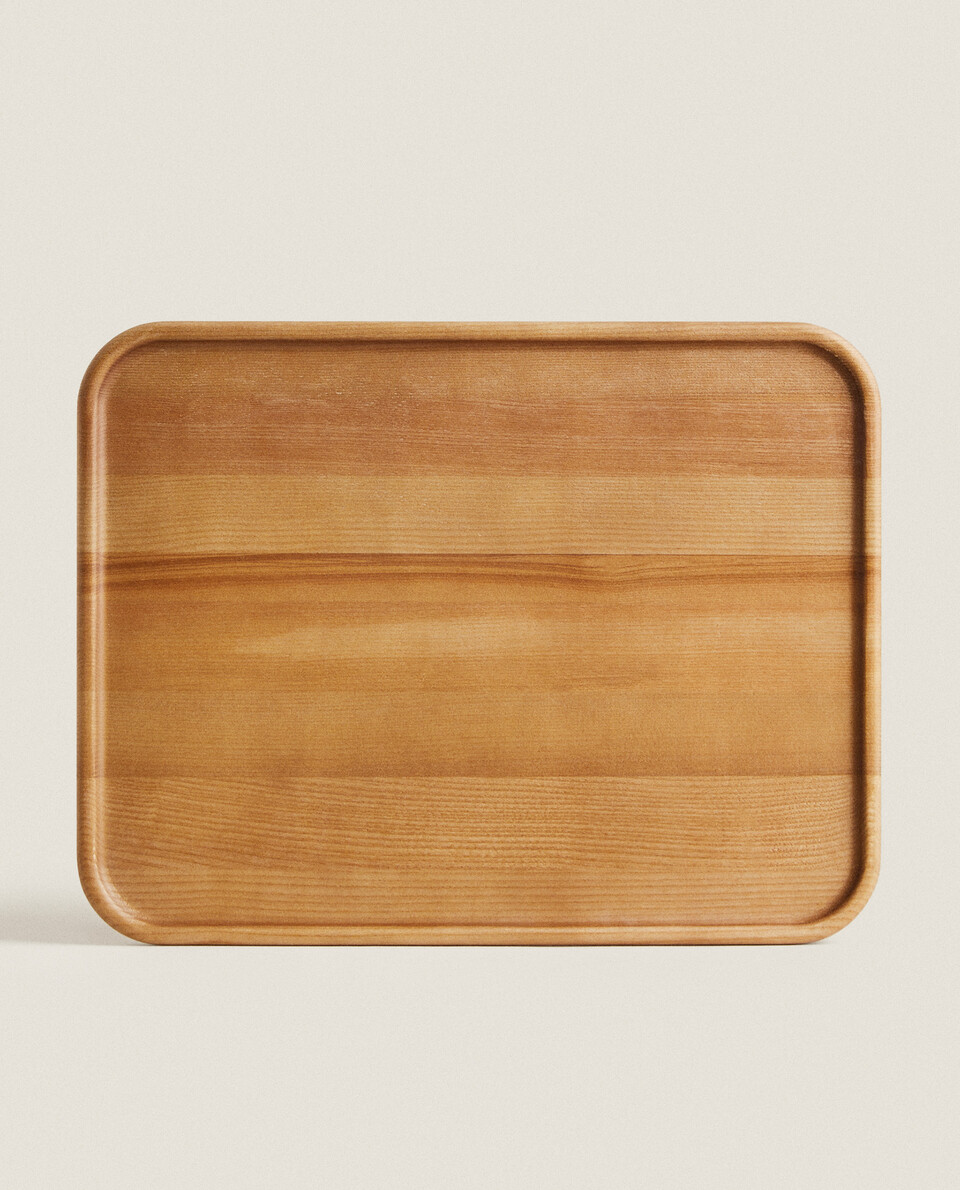 TRAY WITH ROUNDED PROFILE