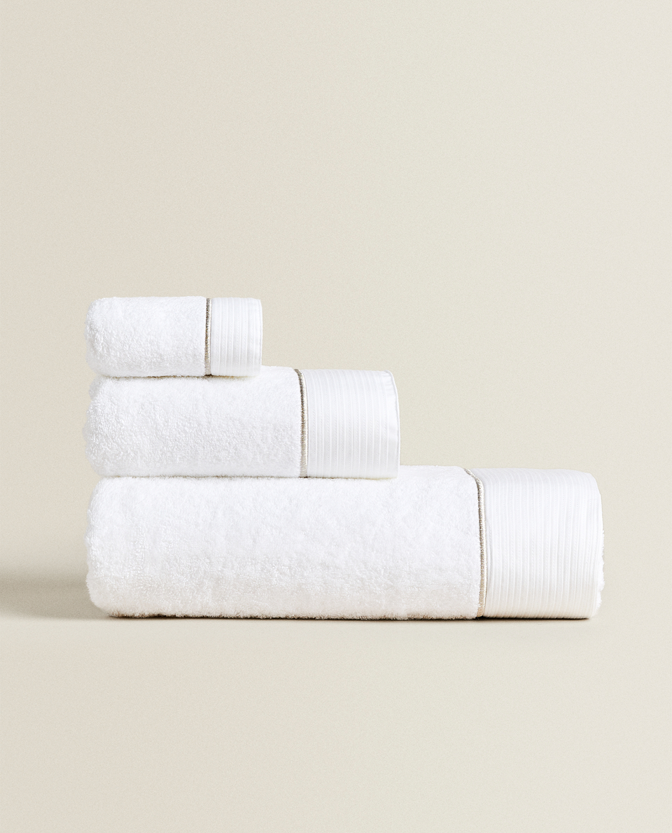 TOWEL WITH PLEATED TRIM
