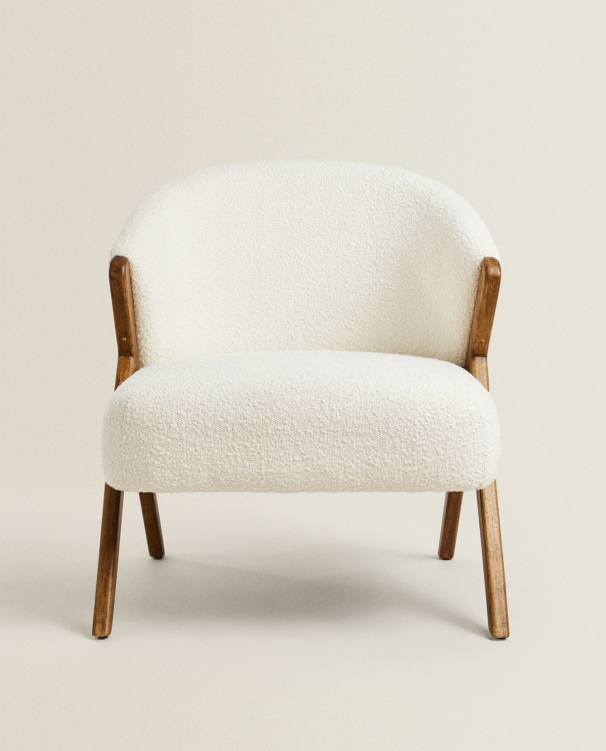 UPHOLSTERED BOUCLÉ ARMCHAIR