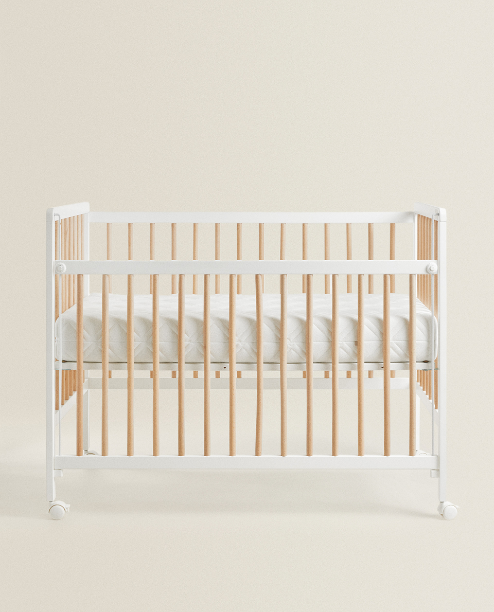 WHITE AND NATURAL WOODEN COT