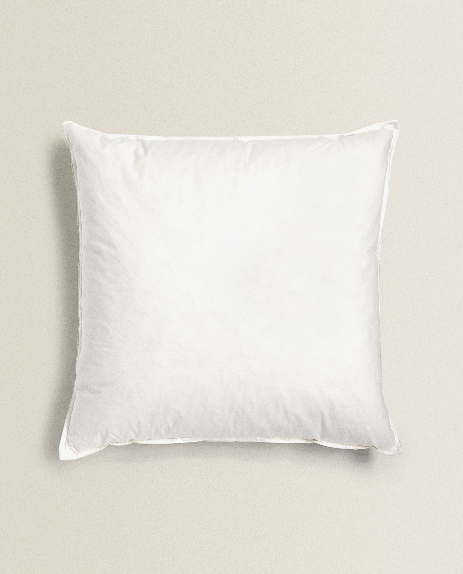 white feather cushion