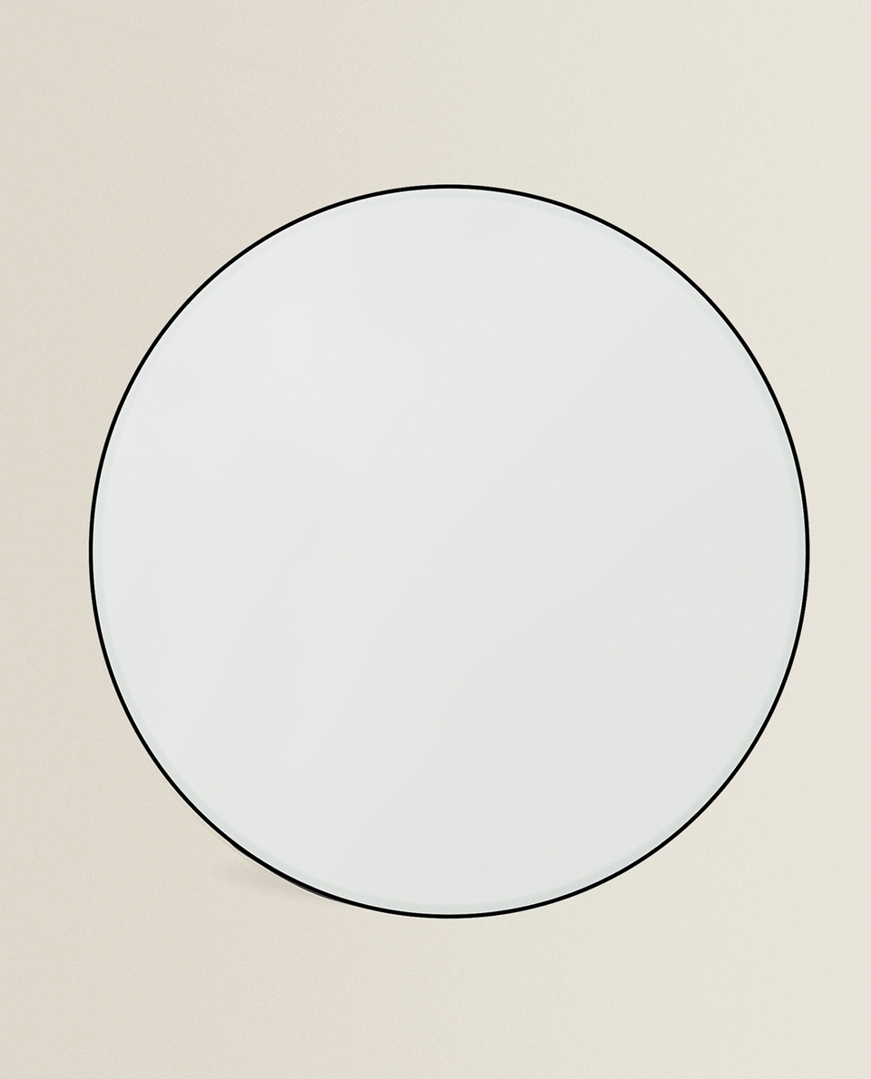 مرآة دائرية الشكل ذات إطار معدني