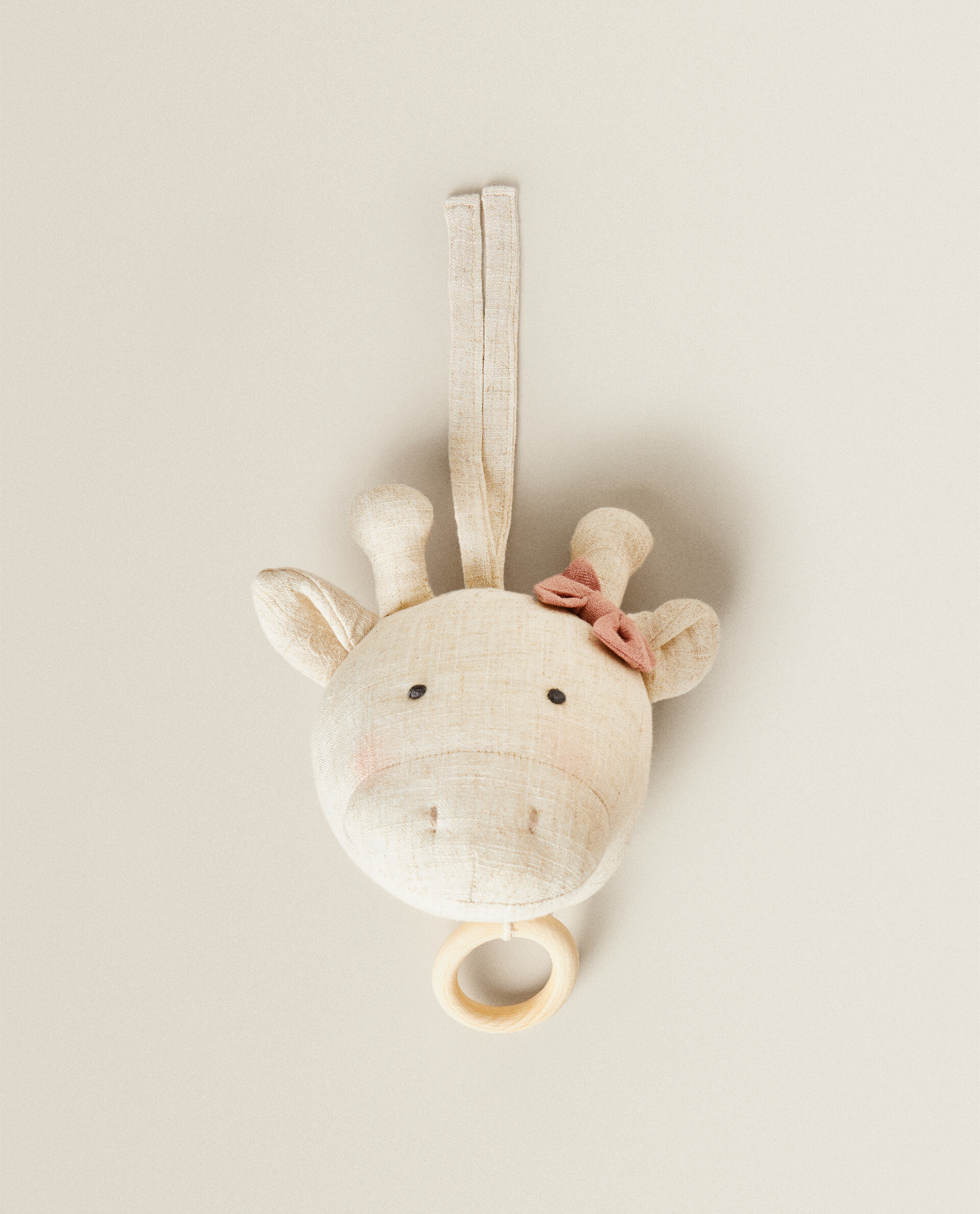 Musical giraffe stuffed toy