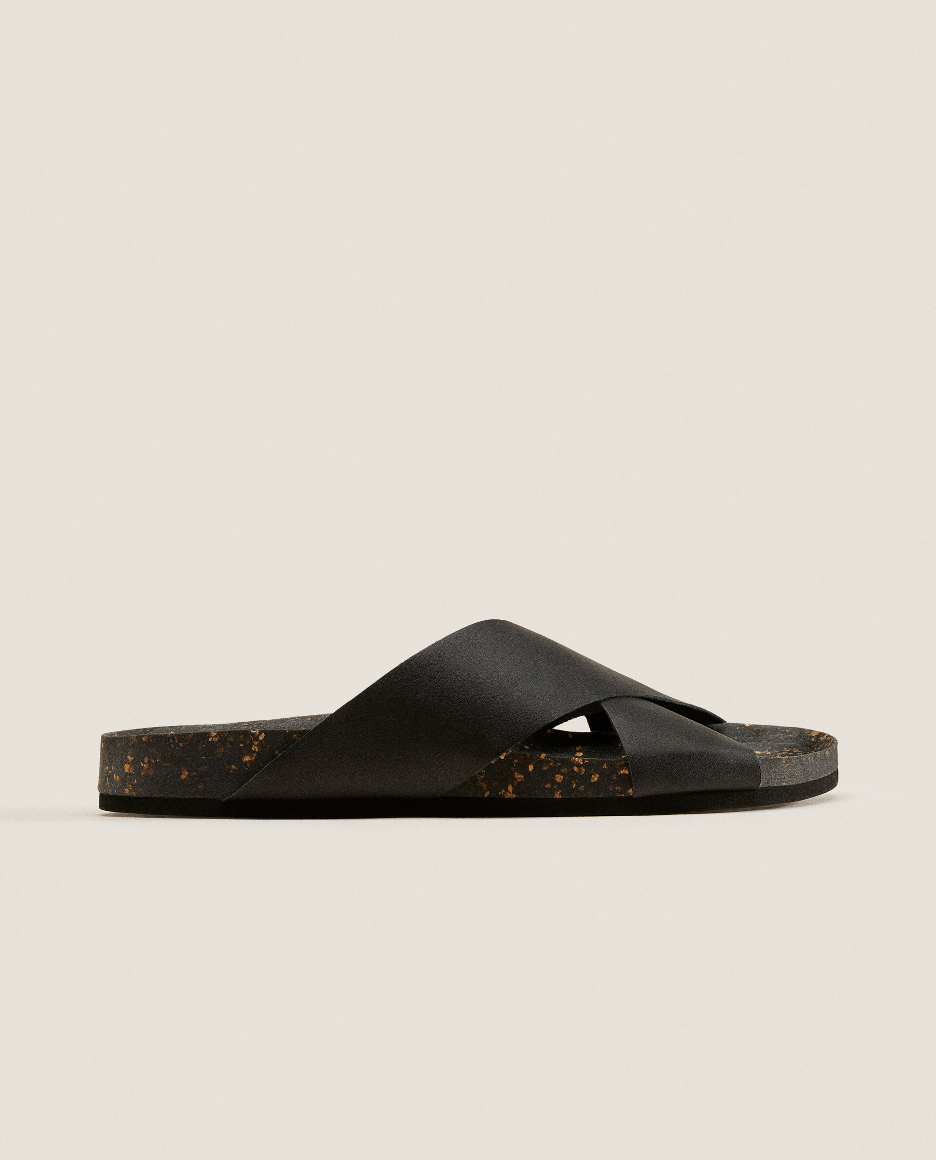 LEATHER CROSSOVER SANDALS