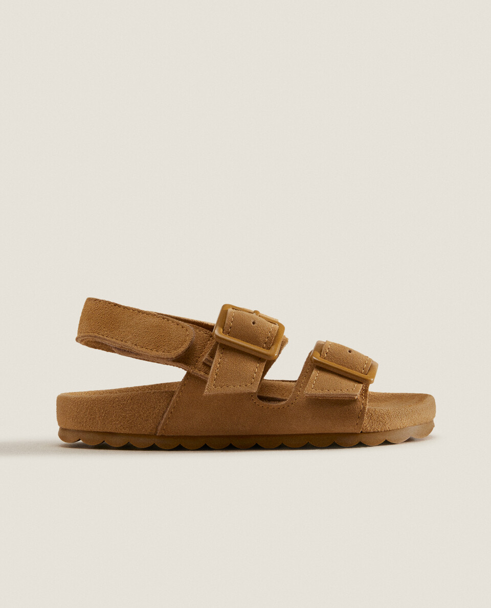 BUCKLED LEATHER SANDALS