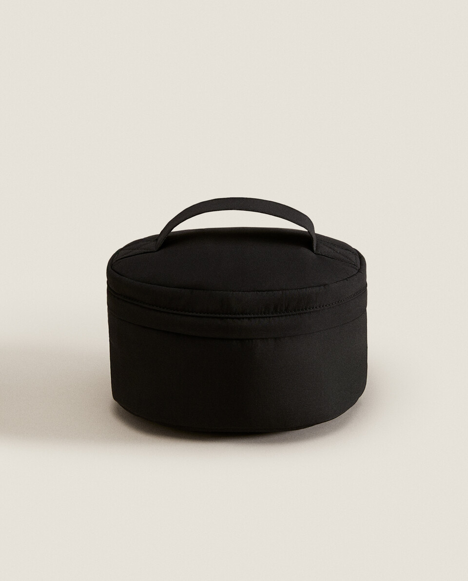 OVAL TECHNICAL FABRIC TOILETRY BAG