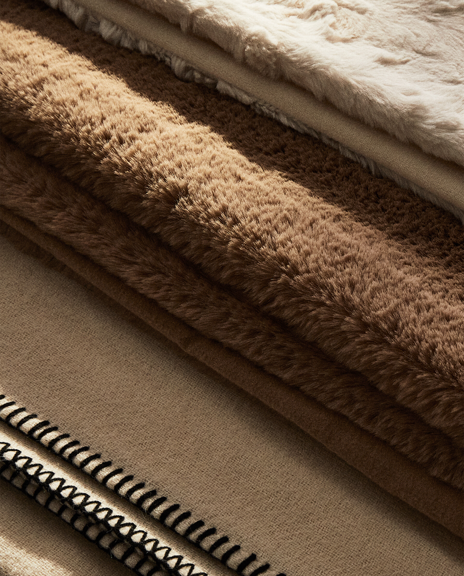 Zara home mantas clearance para sofas