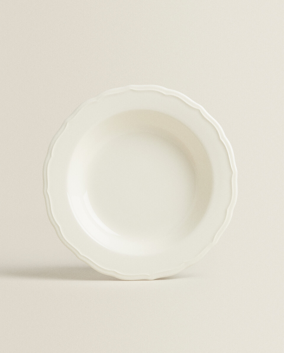 EARTHENWARE SOUP PLATE WITH RAISED-DESIGN EDGE