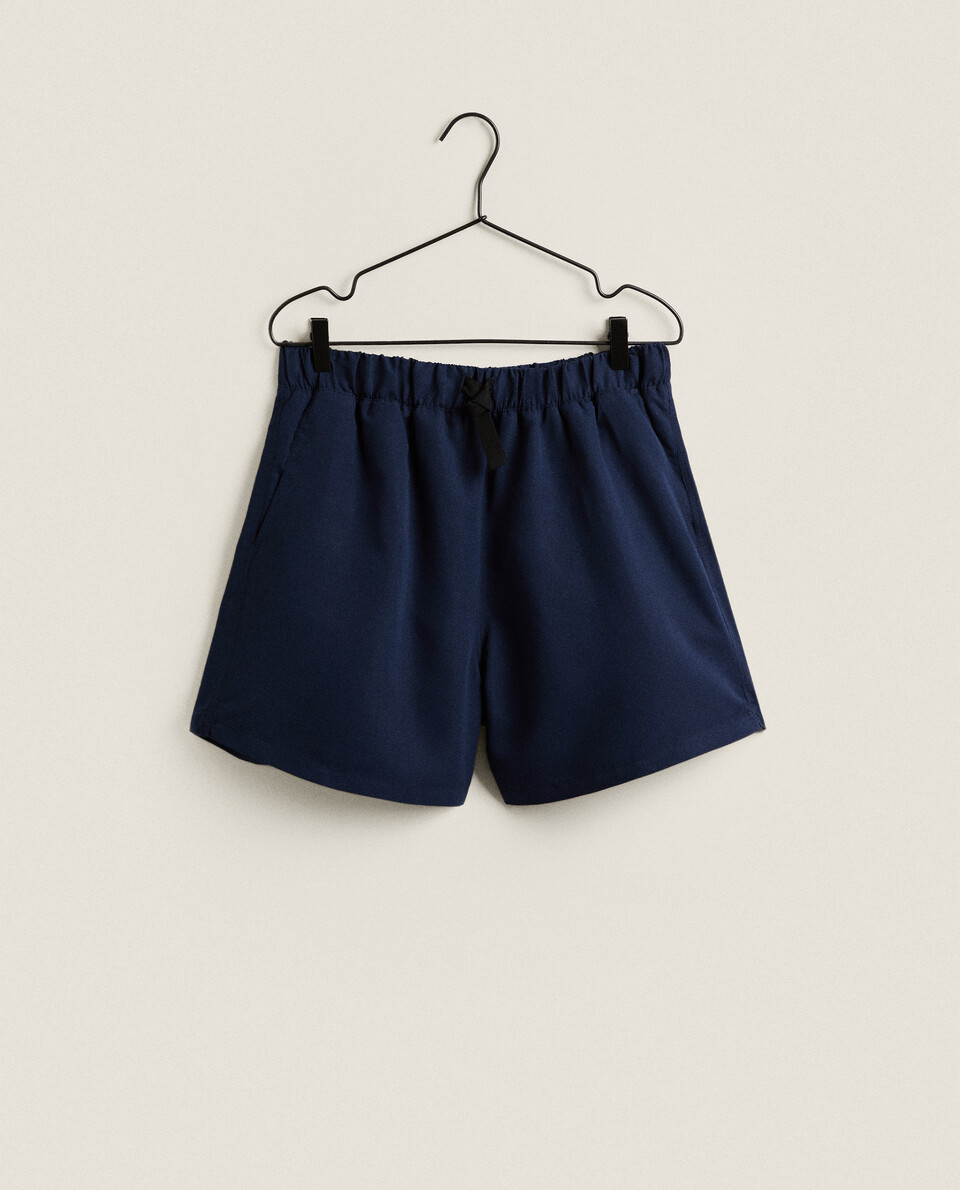 PLAIN SWIMMING TRUNKS