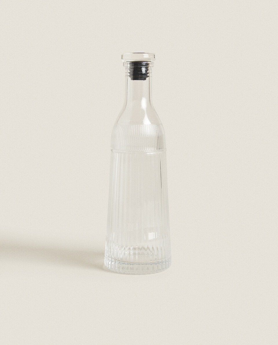 FACETED GLASS BOTTLE