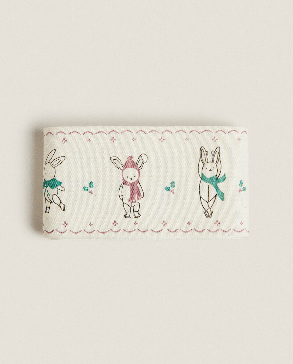 CHILDREN’S WRAPPING PAPER WITH CHRISTMAS BUNNY RABBITS