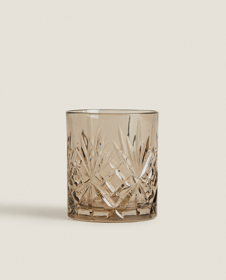 CRYSTALLINE TUMBLER WITH RAISED DESIGN