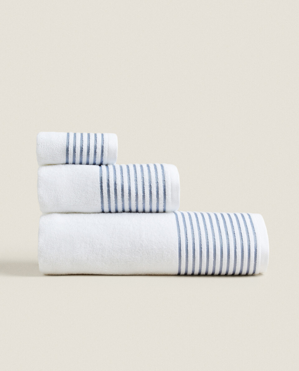 COTTON TOWEL WITH STRIPED BORDER