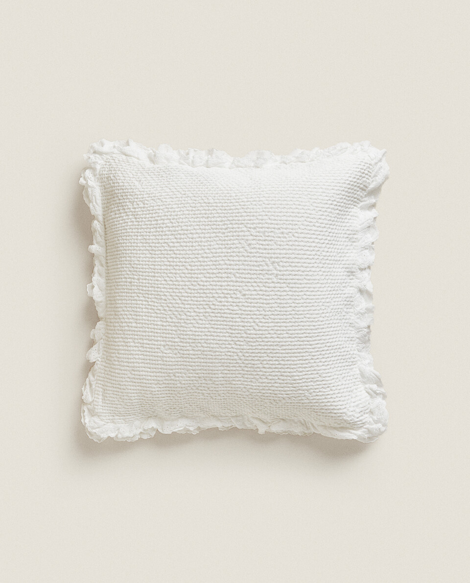 WAFFLE CUSHION COVER WITH EMBROIDERED RUFFLED TRIM