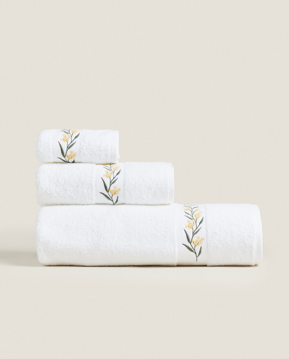 COTTON TOWEL WITH FLORAL BORDER