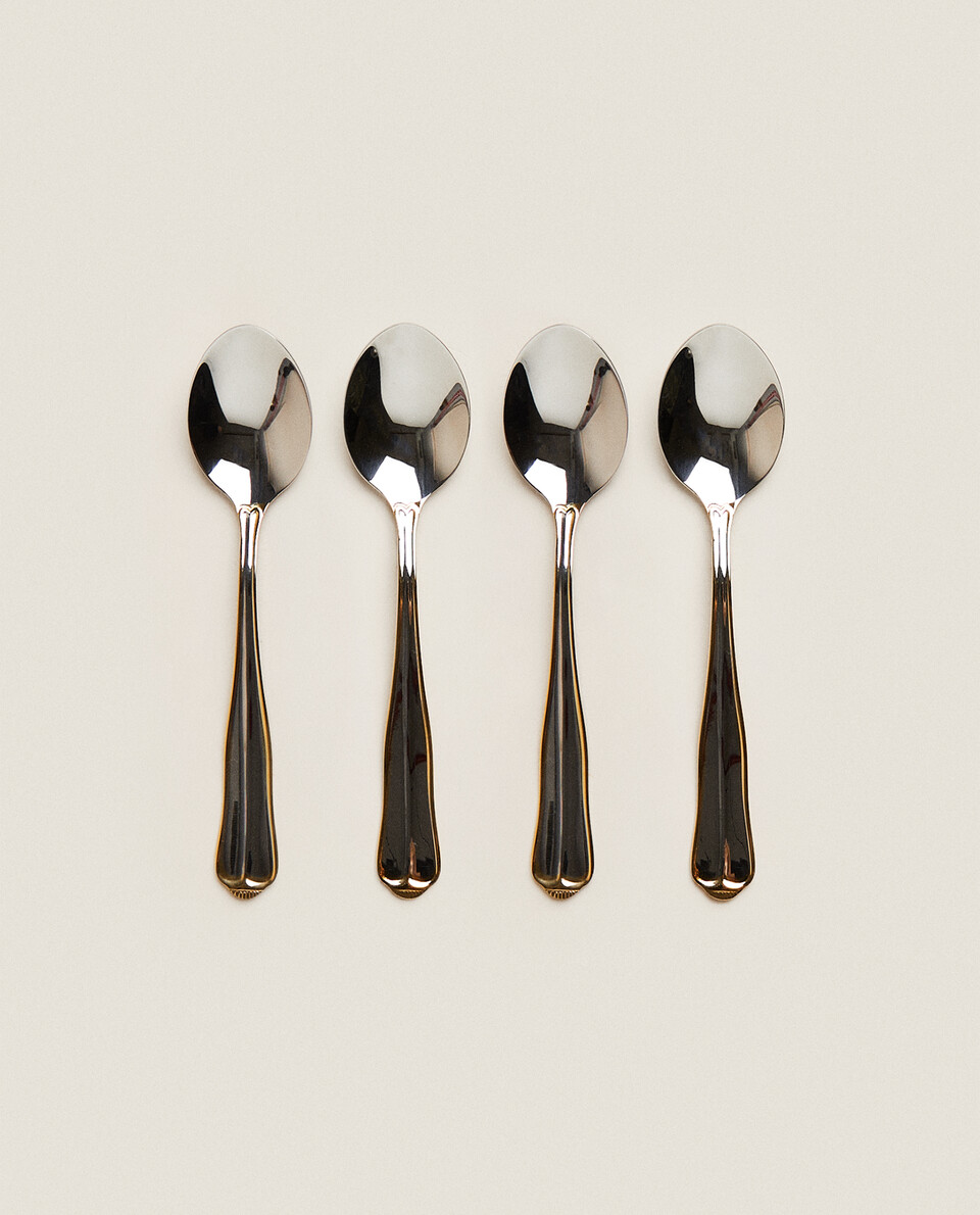 BOX OF 4 SPOONS WITH GOLD RIM