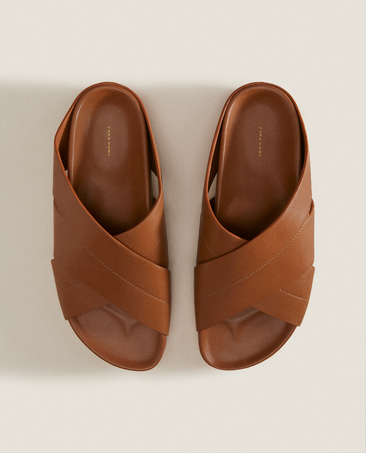 Zara tan slides sales