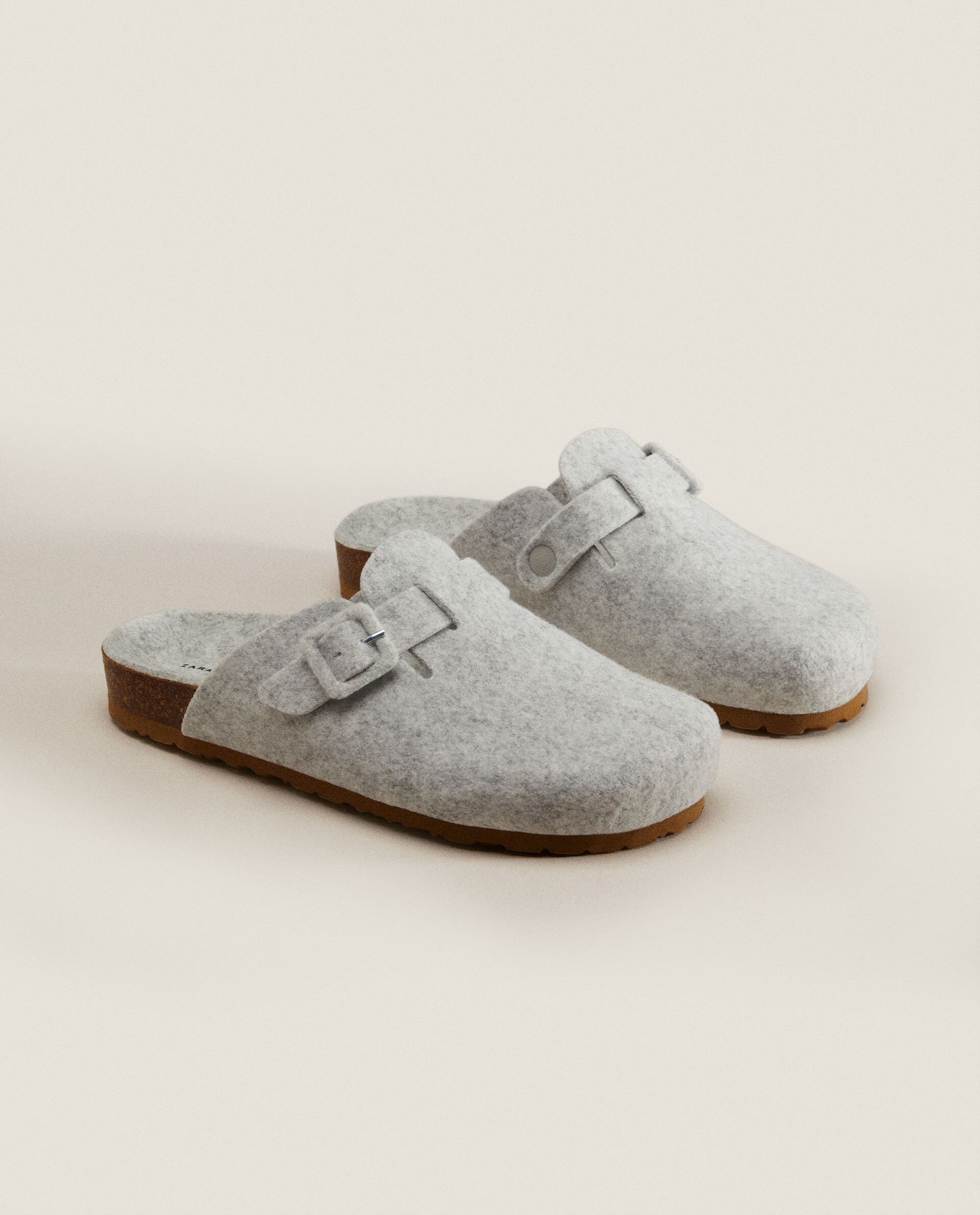 Buckle clearance mule slippers