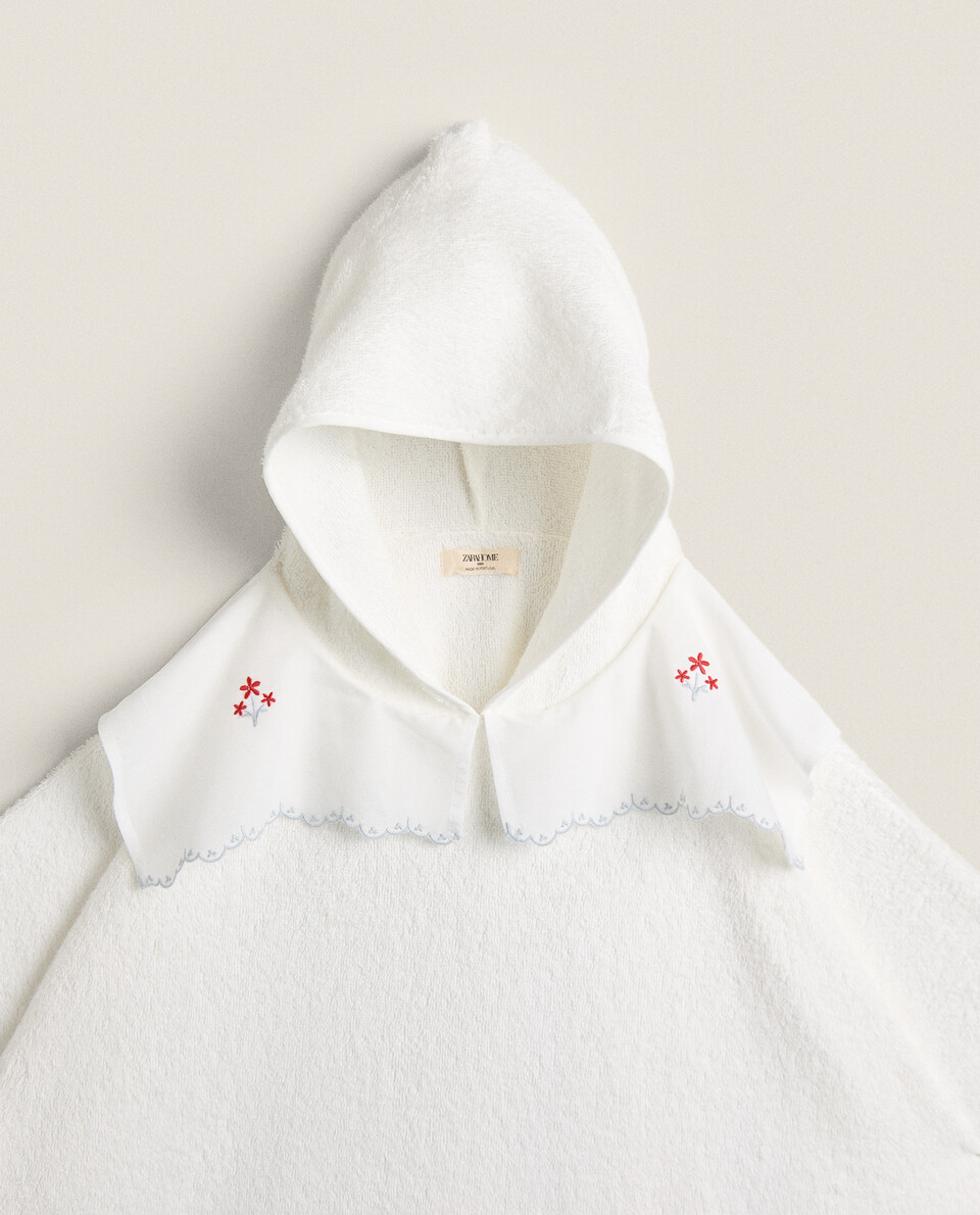 CHILDREN’S PONCHO WITH FLORAL EMBROIDERED COLLAR