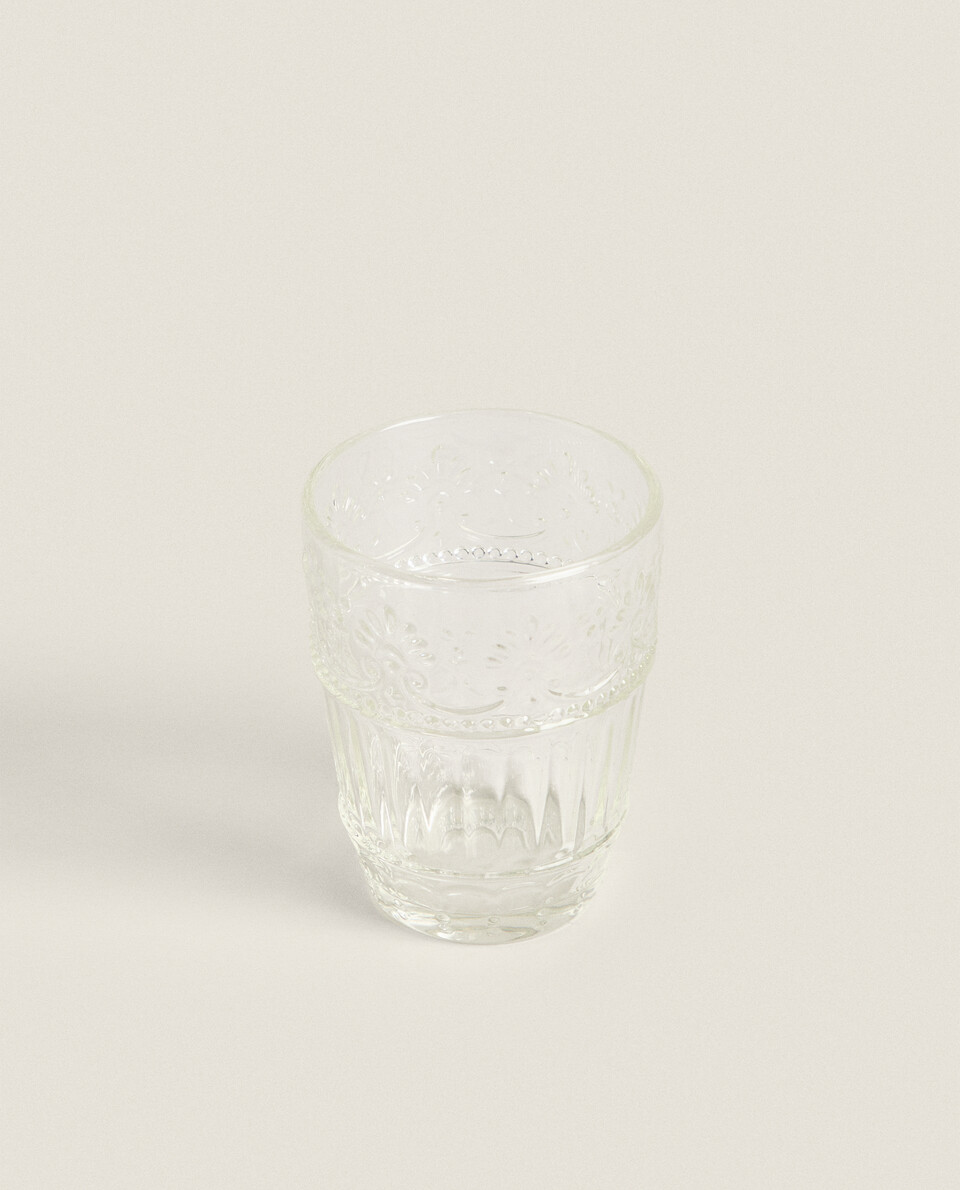 RAISED FLORAL DESIGN GLASS TUMBLER
