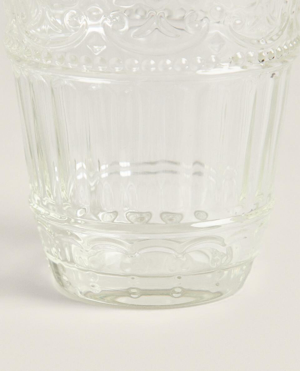 RAISED FLORAL DESIGN GLASS TUMBLER
