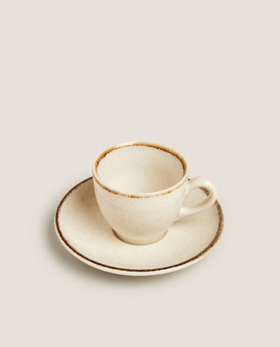 PORCELAIN COFFEE CUP WITH ANTIQUE FINISH RIM