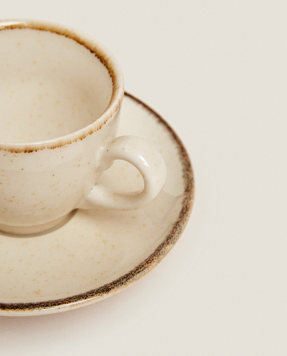 PORCELAIN COFFEE CUP WITH ANTIQUE FINISH RIM