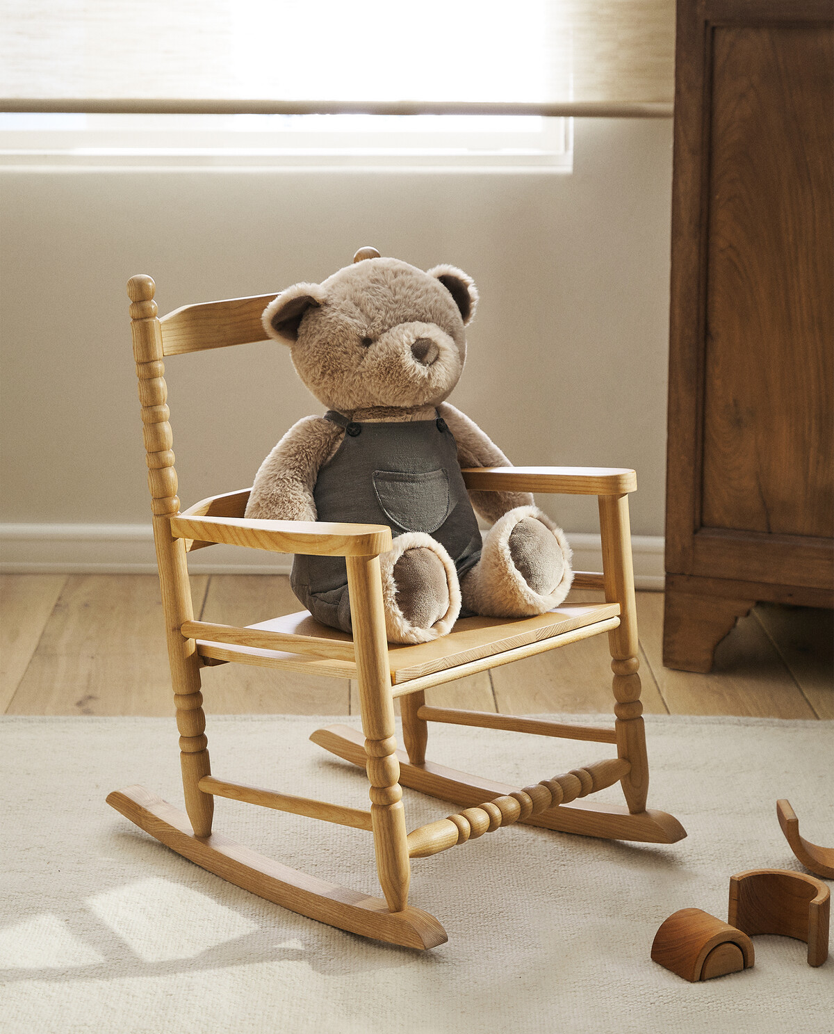 Brown wooden rocking deals chair