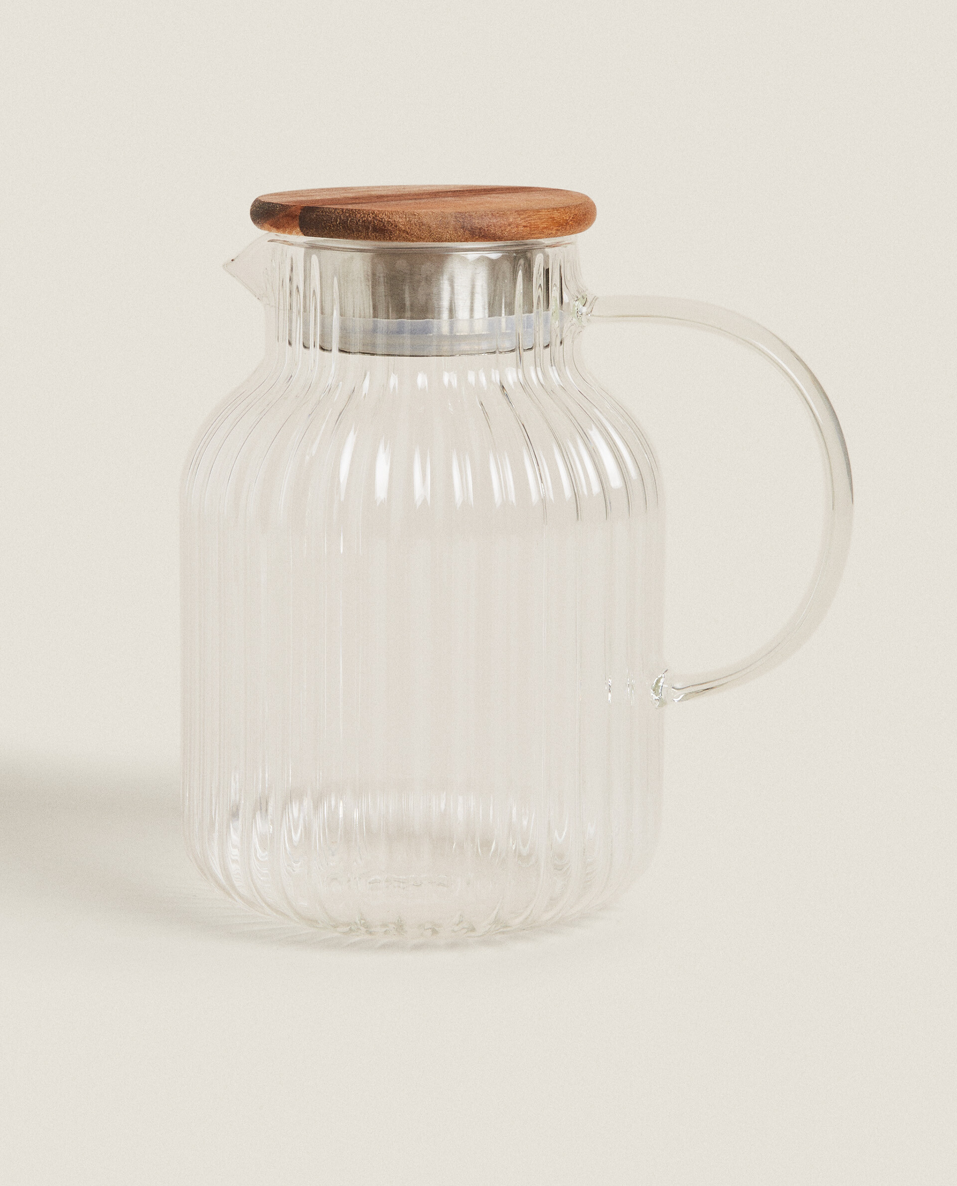 Small glass pitcher with cork stopper