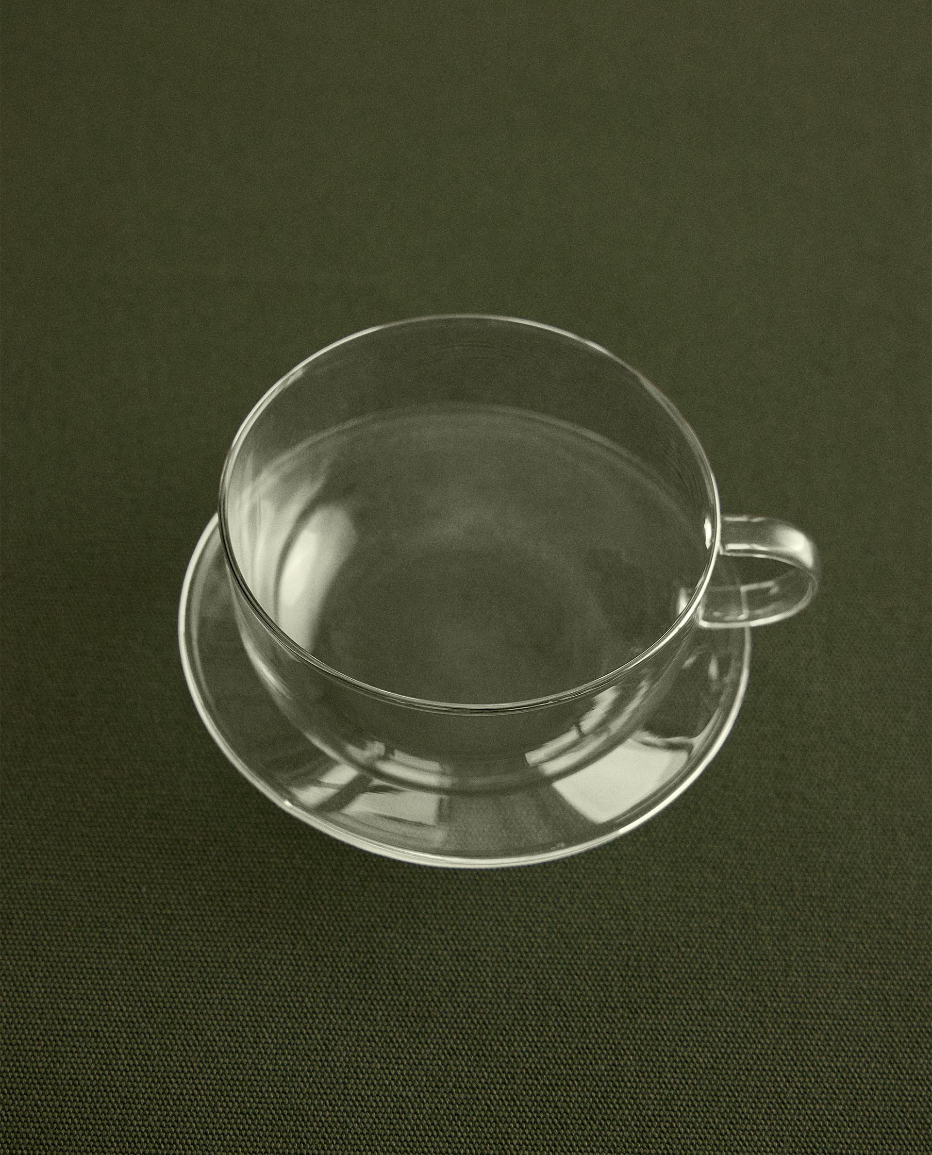 BOROSILICATE GLASS TEACUP AND SAUCER WITH SILVER RIM product thumbnail 2