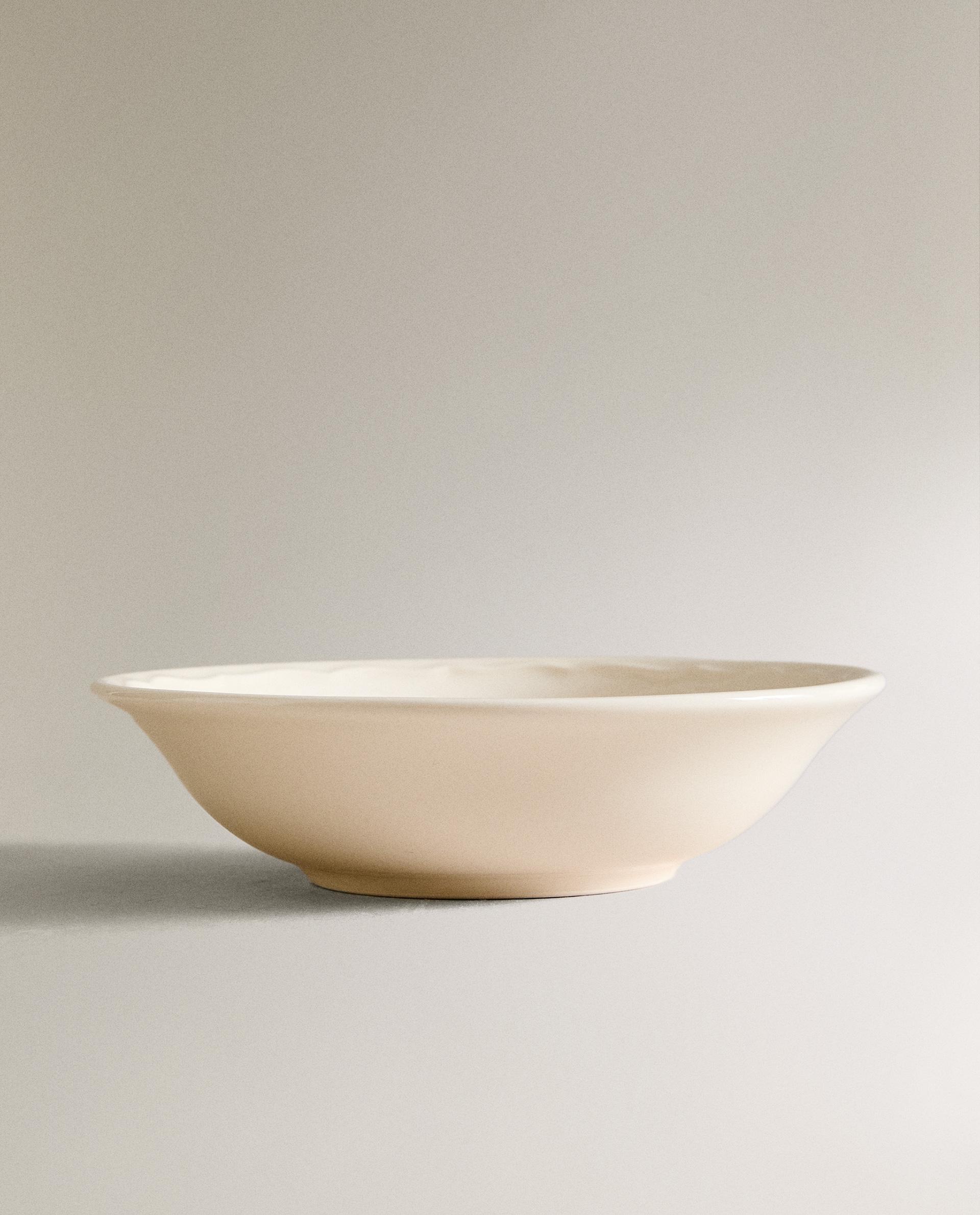 EARTHENWARE BOWL WITH RAISED-DESIGN EDGE