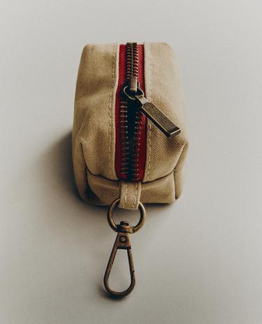 DISPENSADOR DE SACOS PARA ANIMAIS DE ESTIMAÇÃO