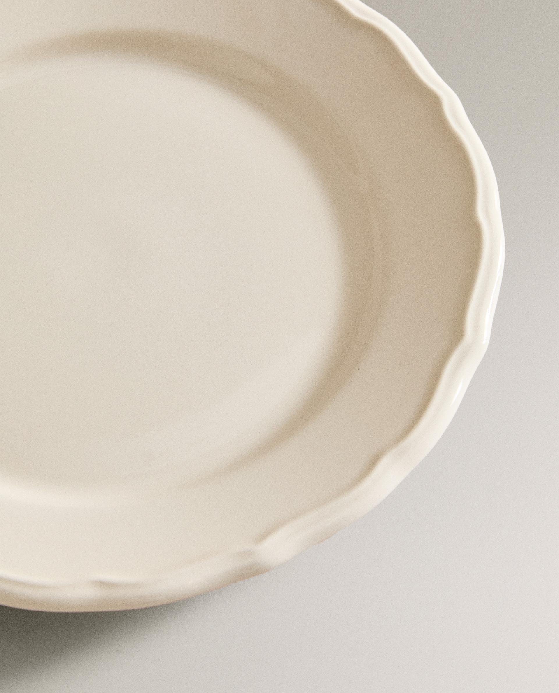 EARTHENWARE DESSERT PLATE WITH RAISED-DESIGN EDGE