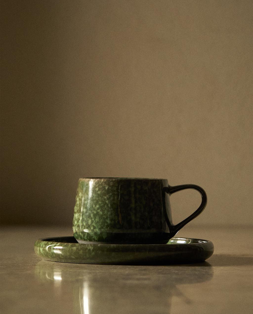 GREEN STONEWARE COFFEE CUP AND SAUCER