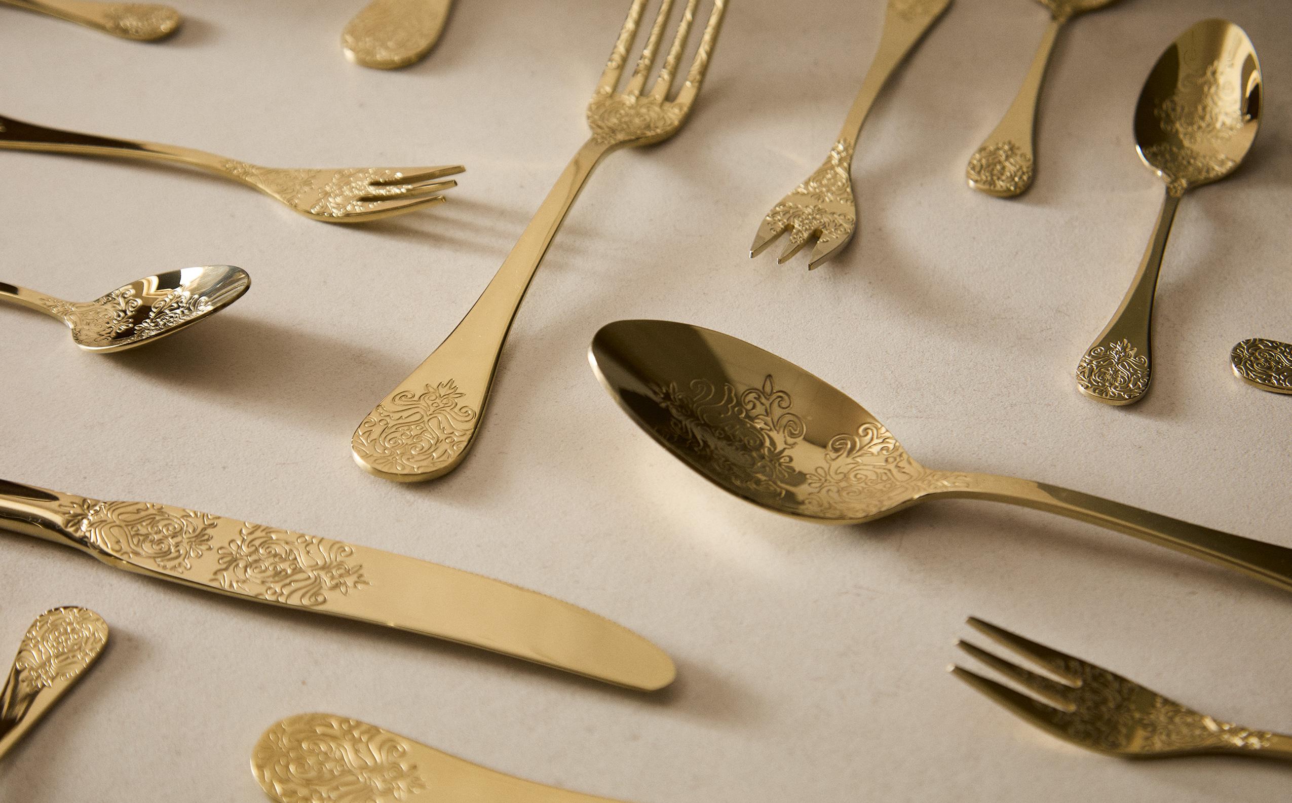 SET OF ENGRAVED CUTLERY