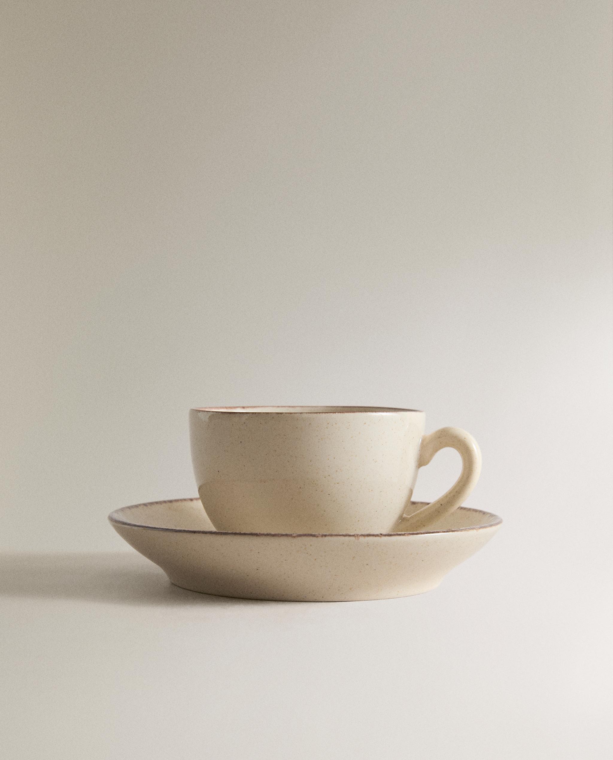 STONEWARE TEACUP AND SAUCER WITH ANTIQUE FINISH RIM product thumbnail 6