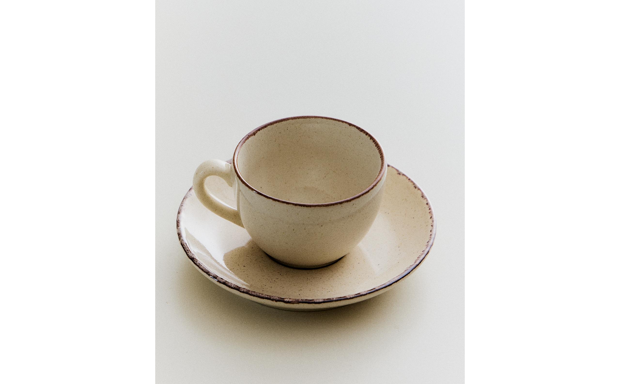 STONEWARE TEACUP AND SAUCER WITH ANTIQUE FINISH RIM product thumbnail 2