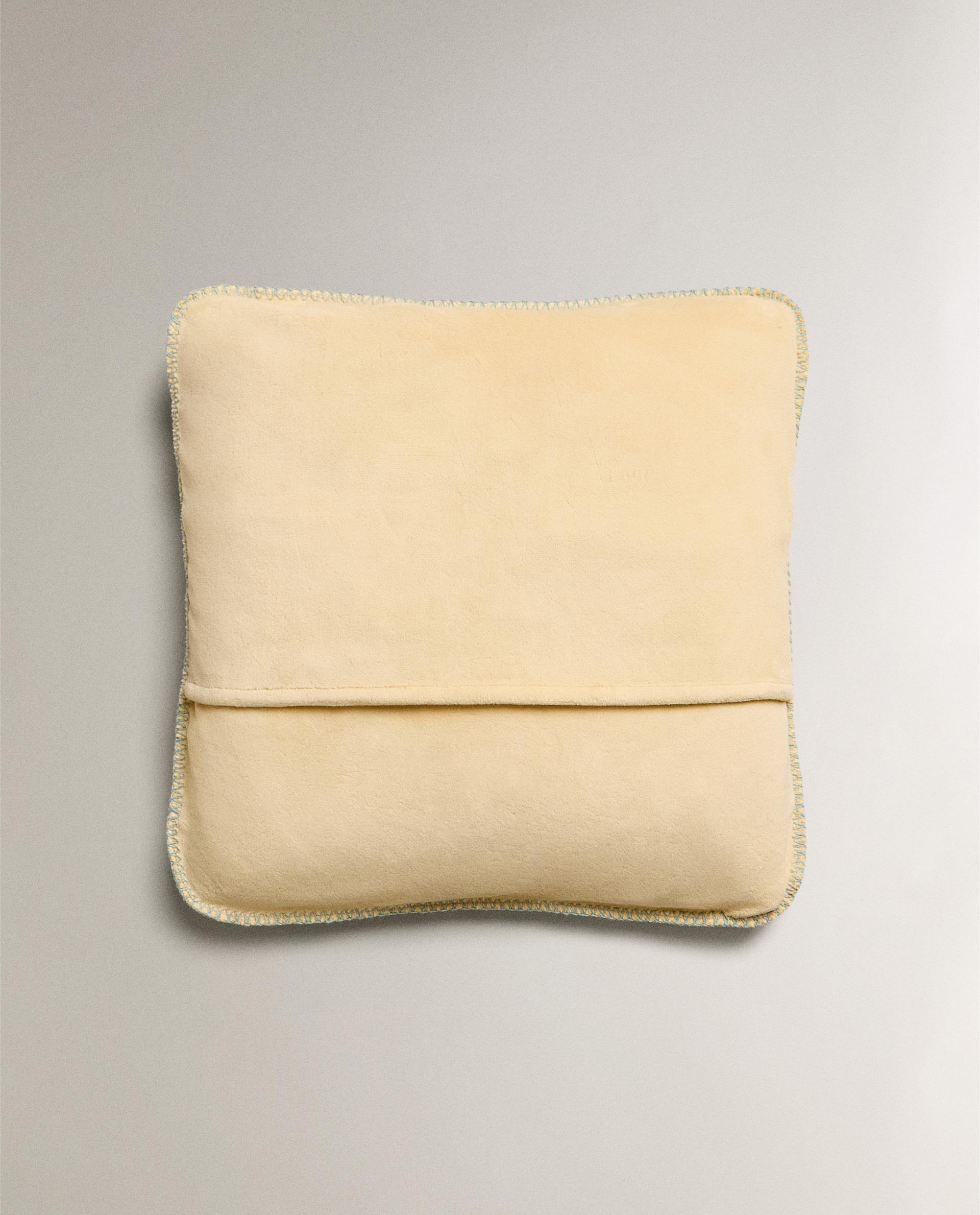 CHILDREN'S PEANUTS™ CUSHION COVER WITH RAISED DESIGN