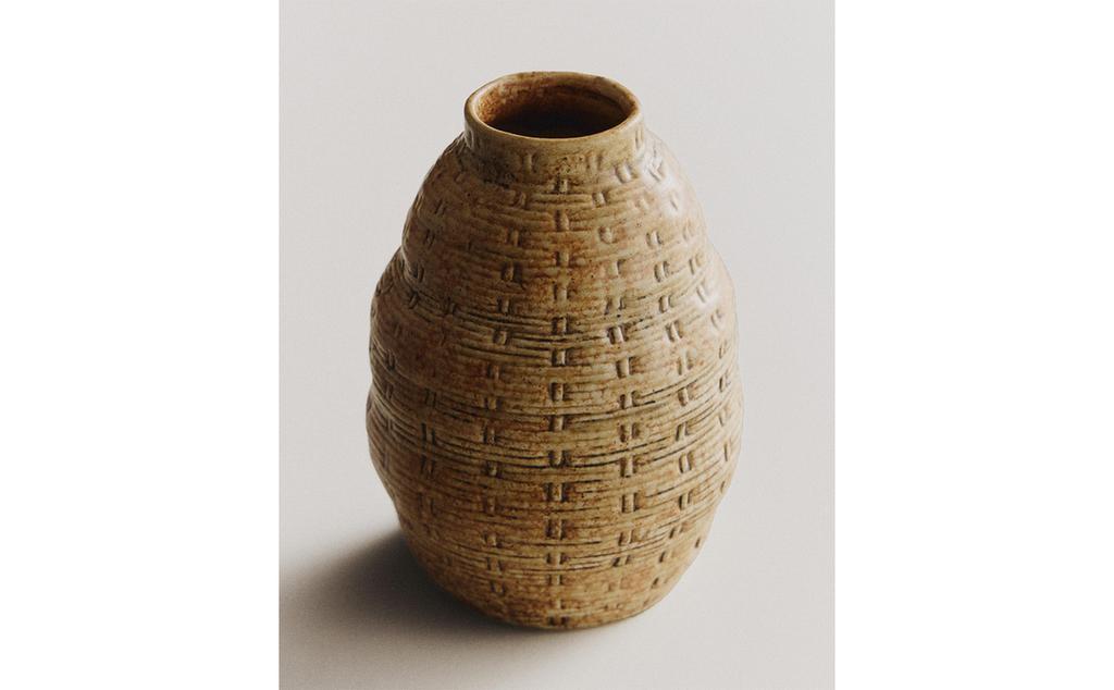 IRREGULAR CLAY VASE