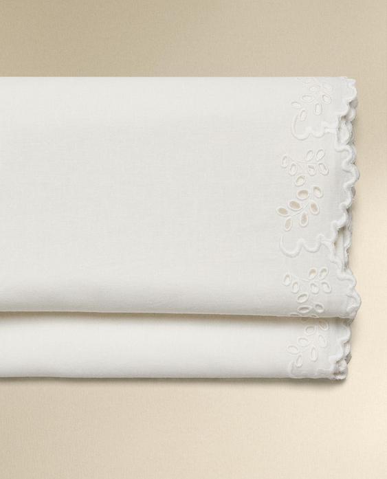 EMBROIDERED FLAT SHEET WITH TRIM
