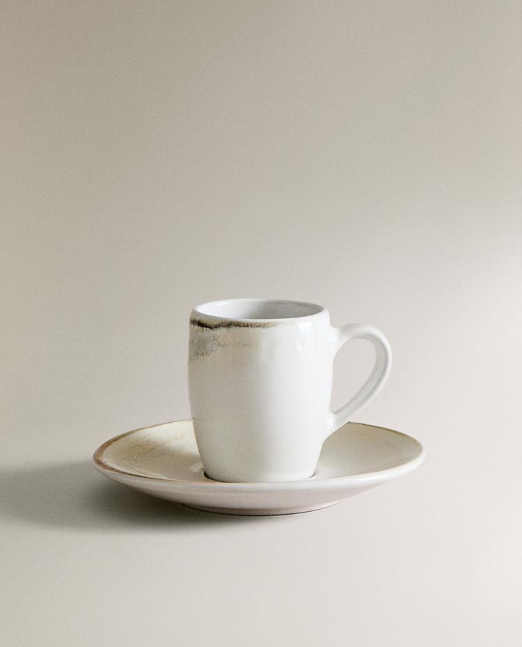 STONEWARE COFFEE CUP AND SAUCER