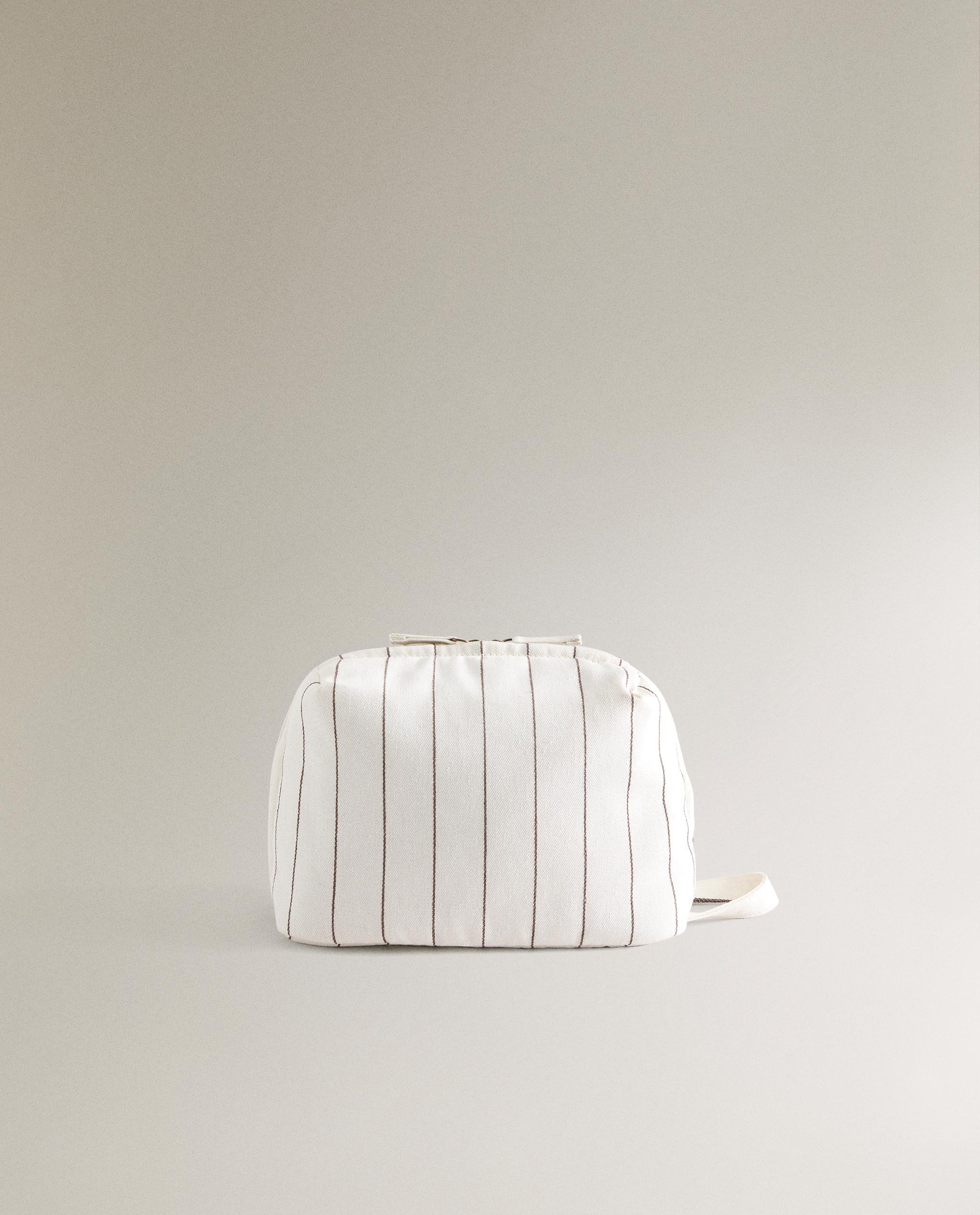 STRIPED TOILETRY BAG