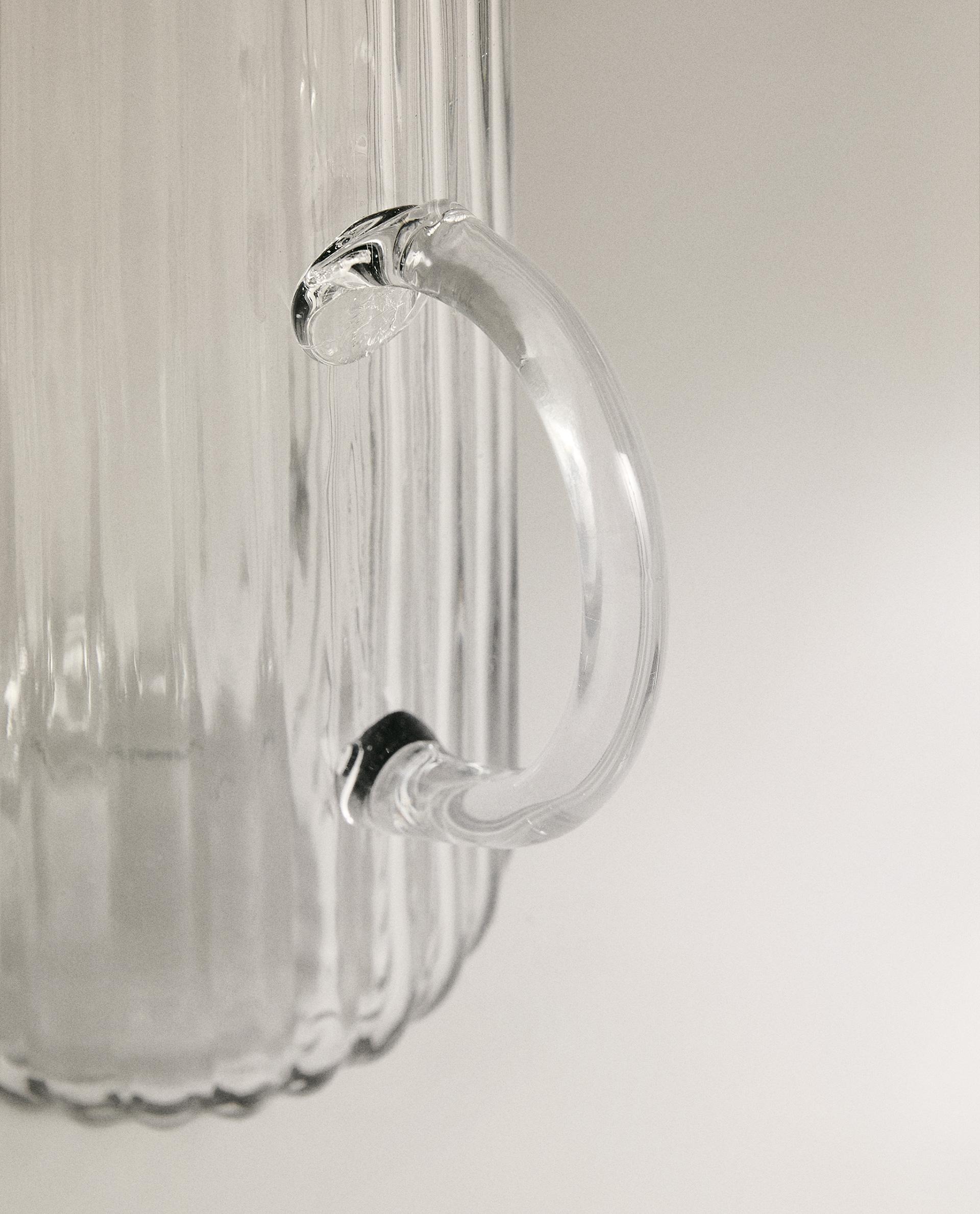 RAISED DESIGN GLASS JUG