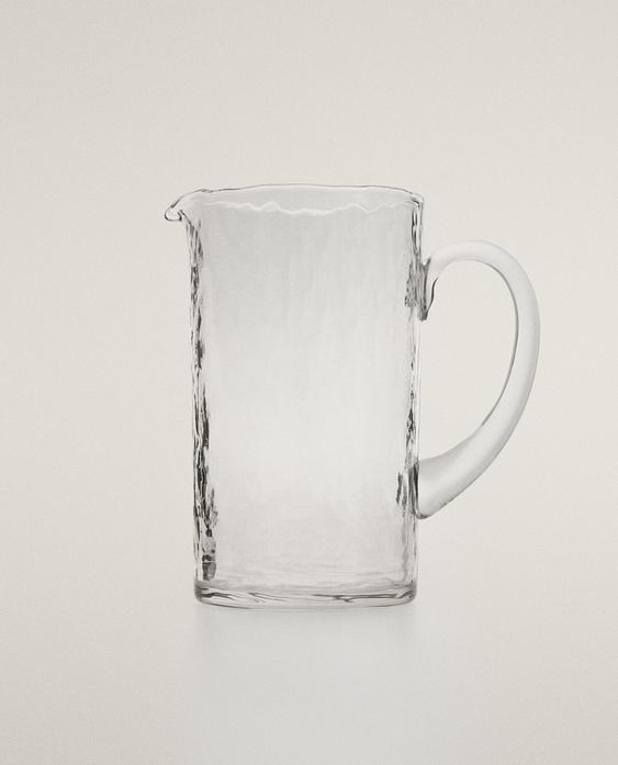 GEHAMERDE GLAZEN KAN