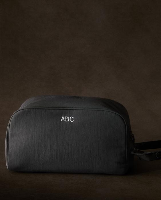 TECHNICAL FABRIC TOILETRY BAG WITH HANDLE